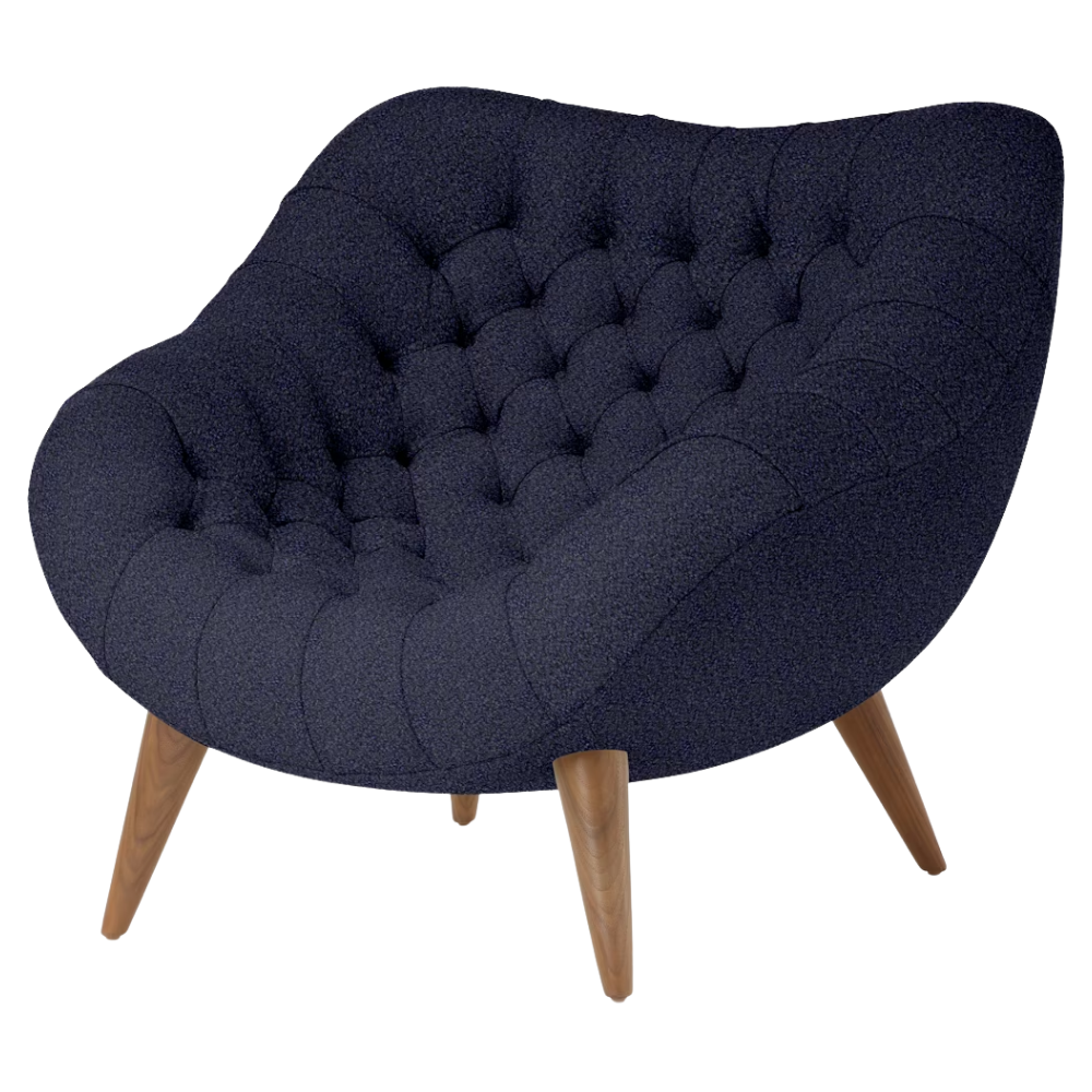 The Rohde Easy Chair from Herman Miller with the navy whim upholstery and walnut leg finish.