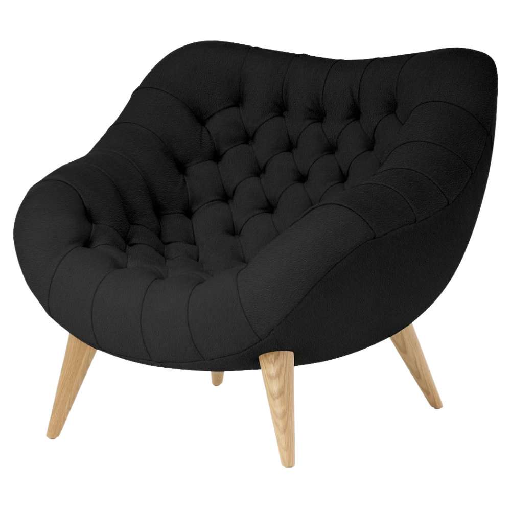 The Rohde Easy Chair from Herman Miller with the obsidian prone leather upholstery and oak leg finish.