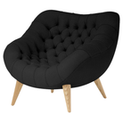 The Rohde Easy Chair from Herman Miller with the obsidian prone leather upholstery and oak leg finish.