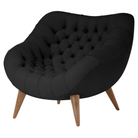 The Rohde Easy Chair from Herman Miller with the obsidian prone leather upholstery and walnut leg finish.