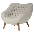 The Rohde Easy Chair from Herman Miller with the shell mode upholstery and walnut leg finish.