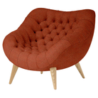 The Rohde Easy Chair from Herman Miller with the terra cotta whim upholstery and oak leg finish.