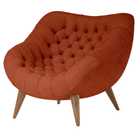 The Rohde Easy Chair from Herman Miller with the terra cotta whim upholstery and walnut leg finish.