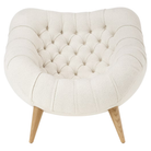 The Rohde Easy Chair from Herman Miller with the warm white whim upholstery and oak leg finish from the front.