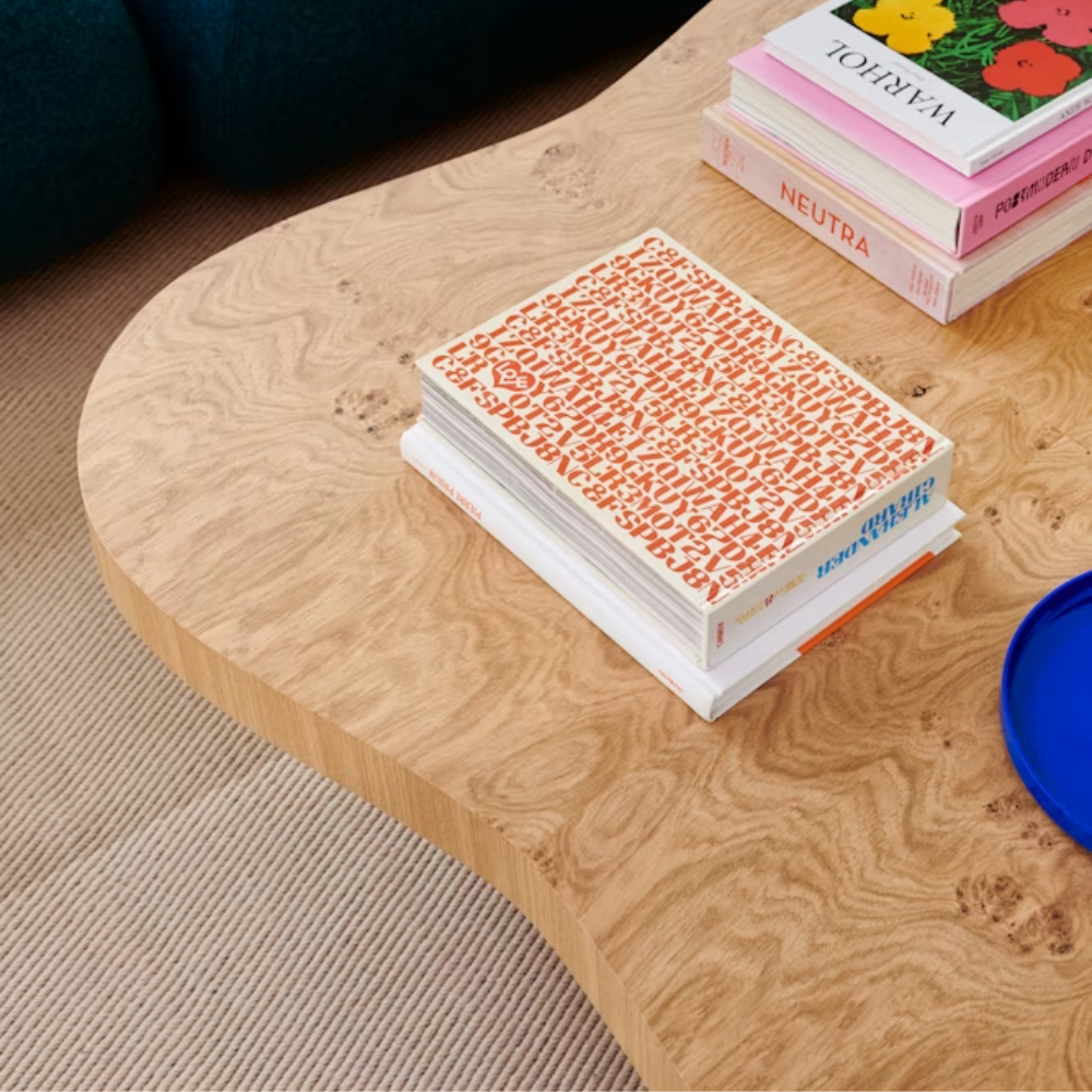 The oak burl Rohde Paldao Coffee Table from Herman Miller in a home office.