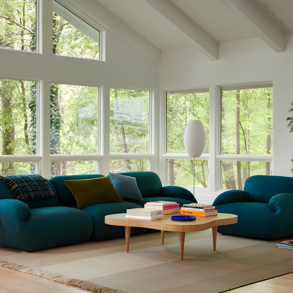 The oak burl Rohde Paldao Coffee Table from Herman Miller in a living space.