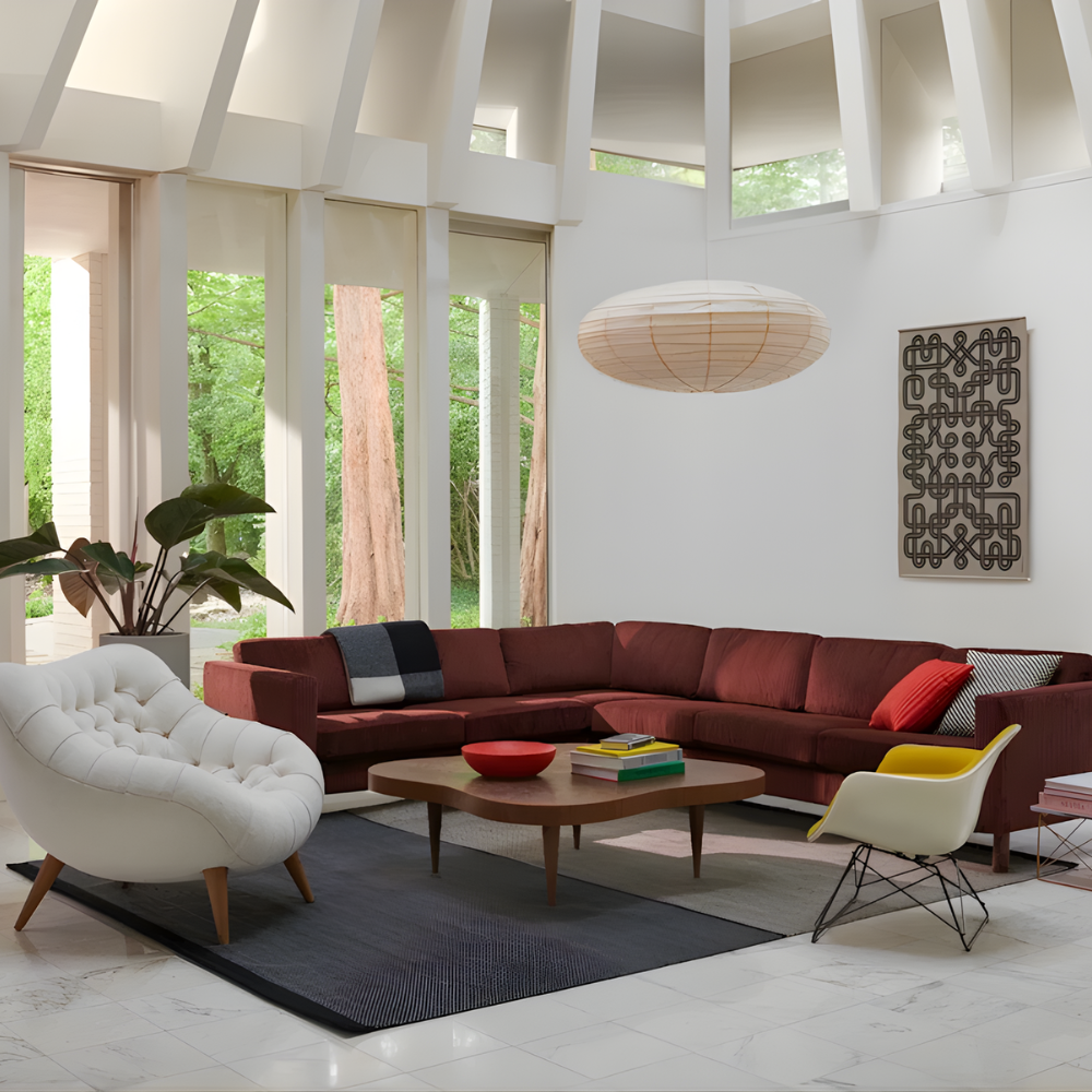 The walnut burl Rohde Paldao Coffee Table from Herman Miller in a lounge.