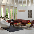 The walnut burl Rohde Paldao Coffee Table from Herman Miller in a lounge.