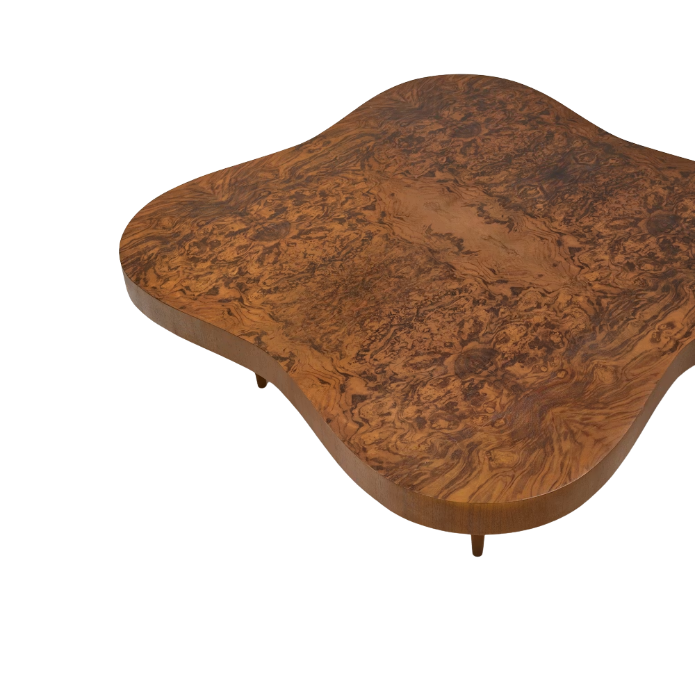 The walnut burl Rohde Paldao Coffee Table from Herman Miller in a studio.