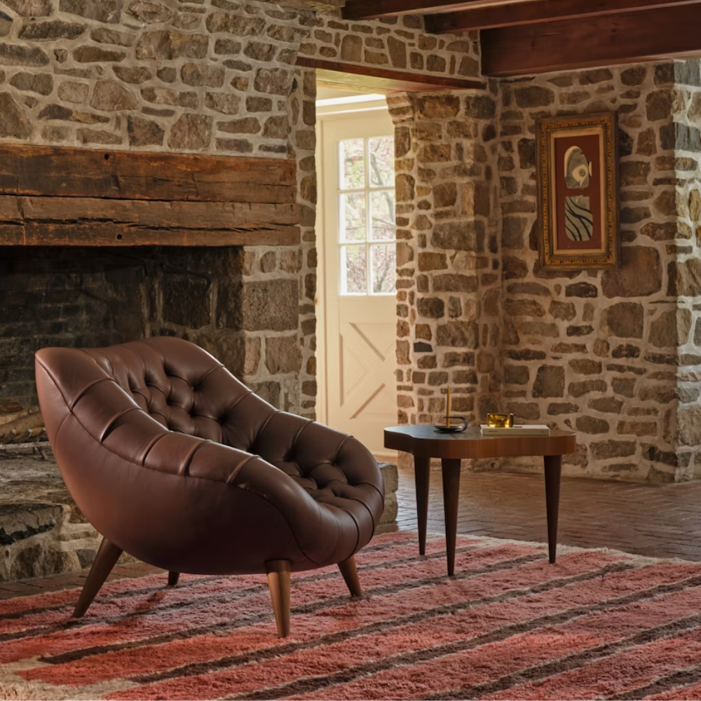 The ebony burl Rohde Paldao Side Table from Herman Miller in a home office.