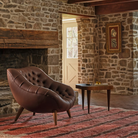 The ebony burl Rohde Paldao Side Table from Herman Miller in a home office.