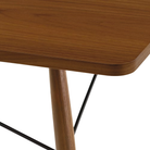 The Square Eames Coffee Table from Herman Miller with the walnut table top and legs close up.