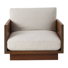 The Tudor Walnut Pawson Drift Lounge Chair from Herman Miller with mode shell upholstery from the front.