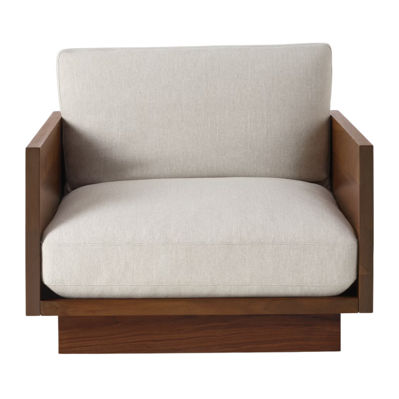 The Tudor Walnut Pawson Drift Lounge Chair from Herman Miller with mode shell upholstery from the front.