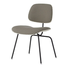 The Upholstered Eames Molded Plastic Dining Chair from Herman Miller with black and white checker upholstery, white shell and ultra black leg finish.