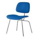 The Upholstered Eames Molded Plastic Dining Chair from Herman Miller with cobalt blue hopsak upholstery, white shell and trivalent chrome leg finish.