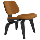 The Upholstered Ebony Eames Molded Plywood Lounge Chair Wood Base from Herman Miller with mode nutmeg upholstery.