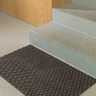 The Hex Doormat by Heymat in a family space.
