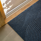 The Sjø Doormat from Heymat in a home.