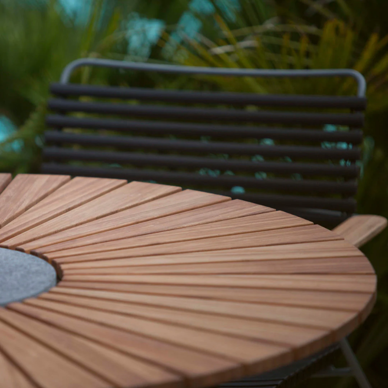 The Circle Outdoor Dining Table by Houe from a close-up of the top.