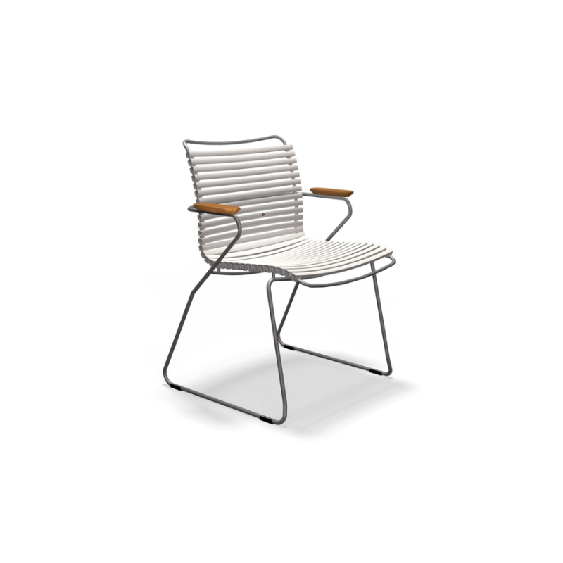 The muted white Click Outdoor Dining Chair by Houe.