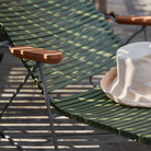 The lemon zest Click Outdoor Sunlounger from Houe from the armrest close-up.