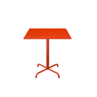 The large cayenne Pico Outdoor Square Café Table with a 4-Star Base by Houe.