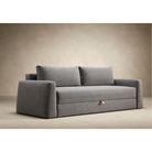 The Cone Sleeper Sofa from Innovation Living with twist granite 565 upholstery in a living area.