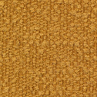 The Cornila Ottoman from Innovation Living boucle ochre 536 upholstery swatch.