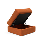 The Cornila Ottoman from Innovation Living with esina rust orange 412 upholstery open.