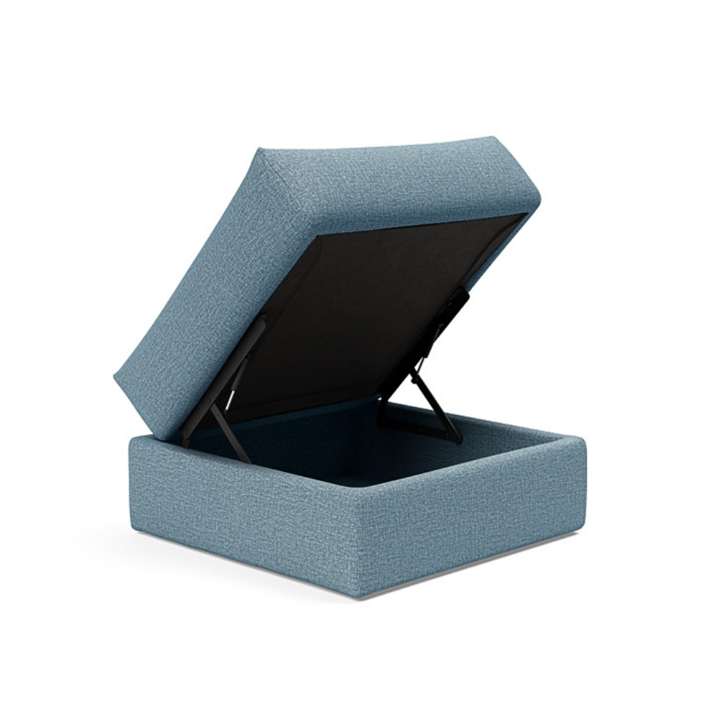 The Cornila Ottoman from Innovation Living with mixed dance light blue 525 upholstery open.