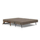 The Cubed Queen Size Sleeper Sofa with Wood Legs from Innovation Living with dark lacquered oak legs and esina cedar brown 411 upholstery setup as a bed.