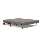 The Cubed Queen Size Sleeper Sofa with Wood Legs from Innovation Living with dark lacquered oak legs and mixed dance grey 521 upholstery setup as a bed.