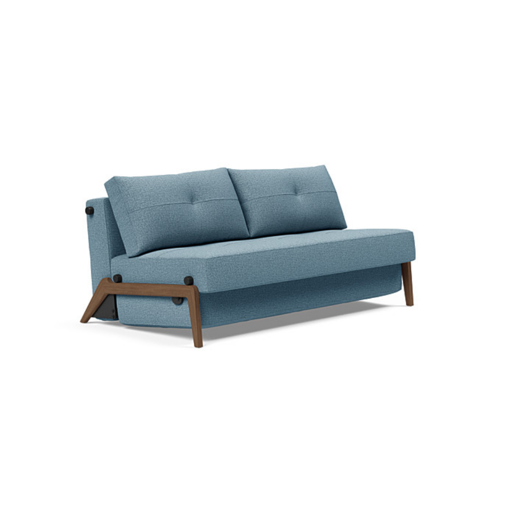 The Cubed Queen Size Sleeper Sofa with Wood Legs from Innovation Living with dark lacquered oak legs and mixed dance light blue 525 upholstery setup as a sofa.