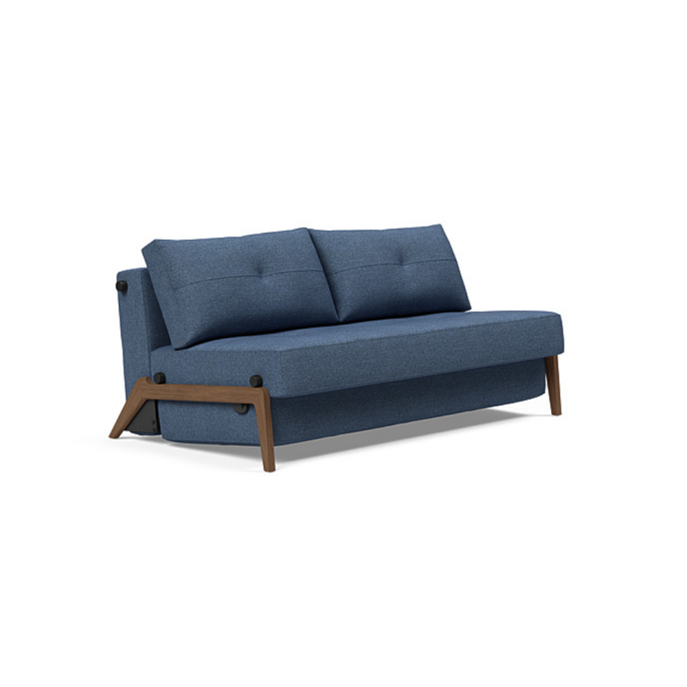 The Cubed Queen Size Sleeper Sofa with Wood Legs from Innovation Living with dark lacquered oak legs and weda blue 302 upholstery setup as a sofa.