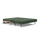 The Cubed Queen Size Sleeper Sofa with Wood Legs from Innovation Living with lacquered oak legs and avella pine green 281 upholstery setup as a bed.