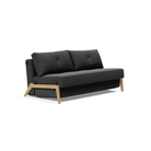 The Cubed Queen Size Sleeper Sofa with Wood Legs from Innovation Living with lacquered oak legs and boucle charcoal 529 upholstery setup as a sofa.