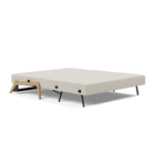 The Cubed Queen Size Sleeper Sofa with Wood Legs from Innovation Living with lacquered oak legs and mixed dance natural 527 upholstery setup as a bed.