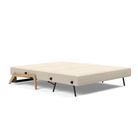 The Cubed Queen Size Sleeper Sofa with Wood Legs from Innovation Living with lacquered oak legs and phobos latte 588 upholstery setup as a bed.