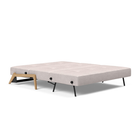 The Cubed Queen Size Sleeper Sofa with Wood Legs from Innovation Living with lacquered oak legs and weda sand 300 upholstery setup as a bed.
