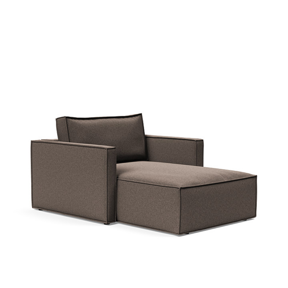 The Newilla Lounger Chair with Slim Arms with boucle taupe 530 upholstery setup as a lounge chair.