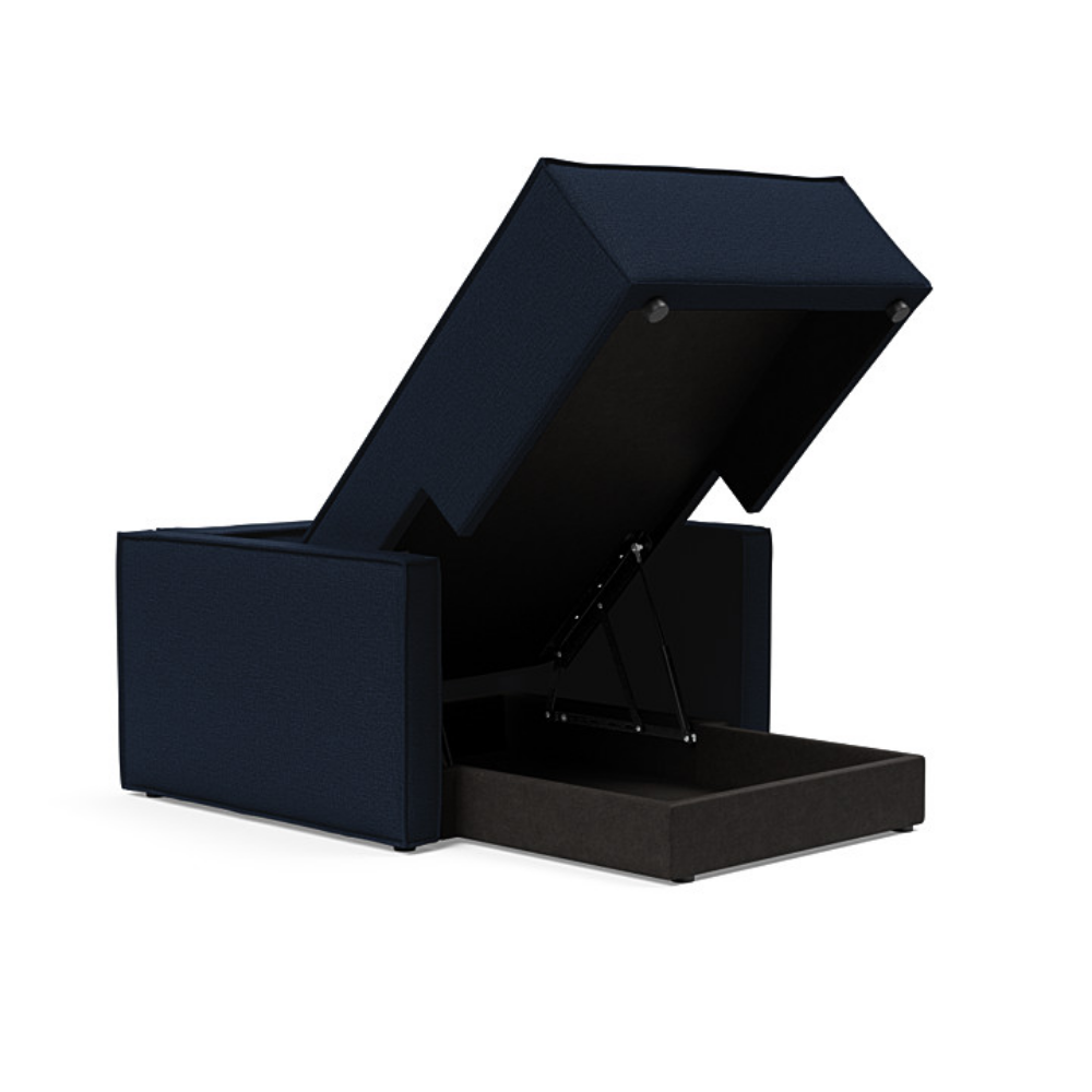 The Newilla Lounger Chair with Slim Arms with mixed dance blue 528 upholstery open showing the integrated storage.