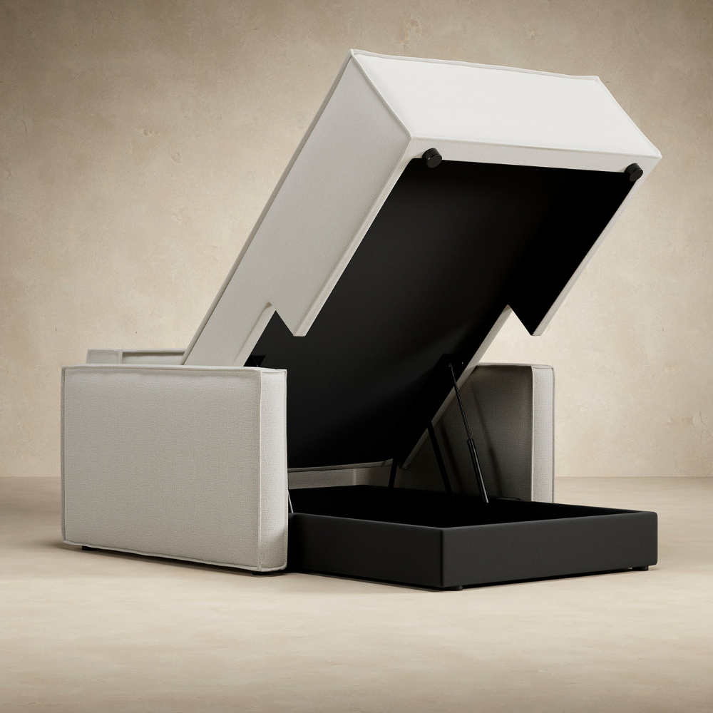 The Newilla Lounger Chair with Slim Arms open showing the storage compartment in a lounge. all-groups