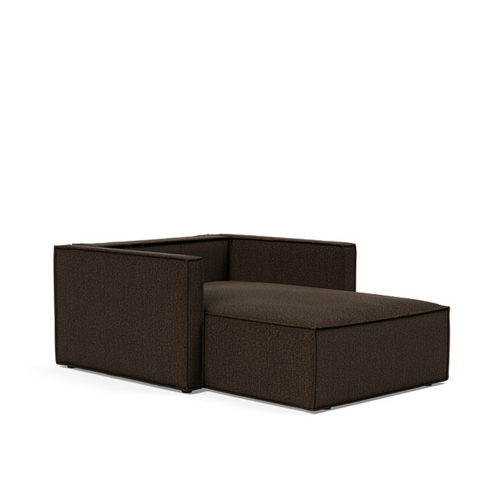 The Newilla Lounger Chair with Slim Arms with taura chocco 358 upholstery without the cushion, setup as a bed.