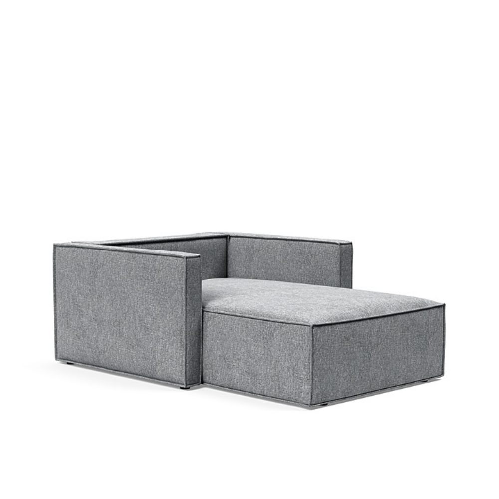 The Newilla Lounger Chair with Slim Arms with twist granite 565 upholstery without the cushion, setup as a bed.