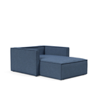 The Newilla Lounger Chair with Slim Arms with weda blue 302 upholstery without the cushion, setup as a bed.