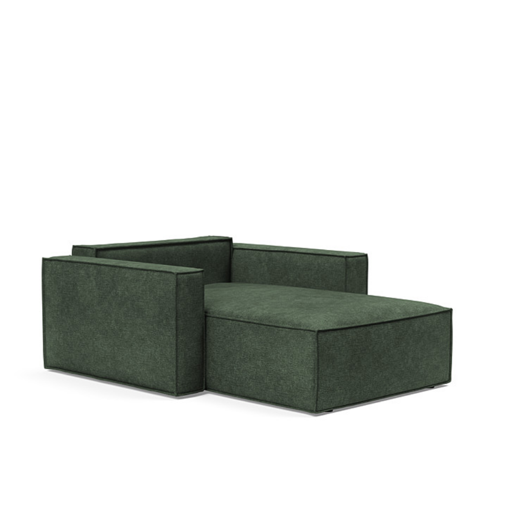 The Newilla Lounger Chair with Standard Arms from Innovation Living with avella pine green 281 upholstery setup as a bed with the cushion removed.