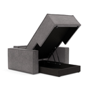 The Newilla Lounger Chair with Standard Arms from Innovation Living with avella warm grey 282 upholstery open showing the internal storage.