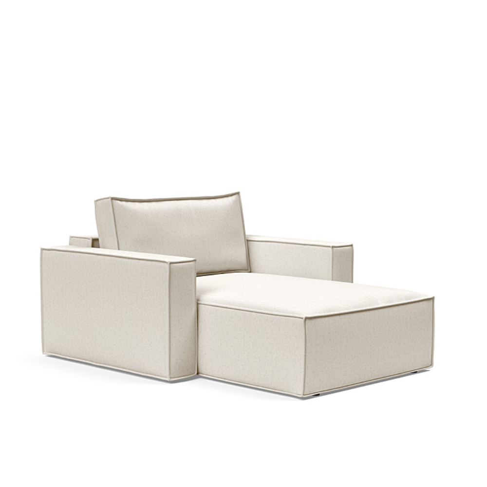 The Newilla Lounger Chair with Standard Arms from Innovation Living with boucle off white 531 upholstery setup as a lounge chair.