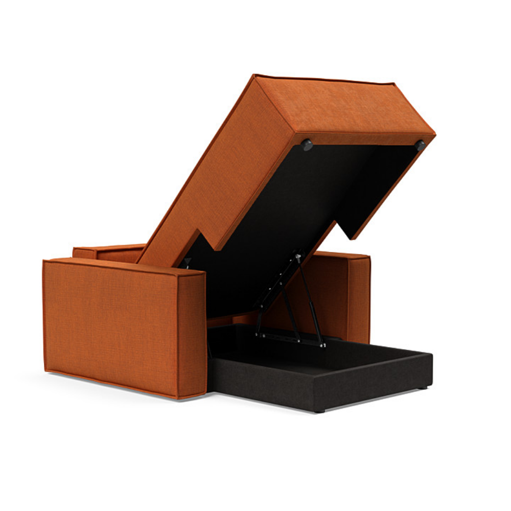 The Newilla Lounger Chair with Standard Arms from Innovation Living with esina rust orange 412 upholstery open and showing the internal storage.